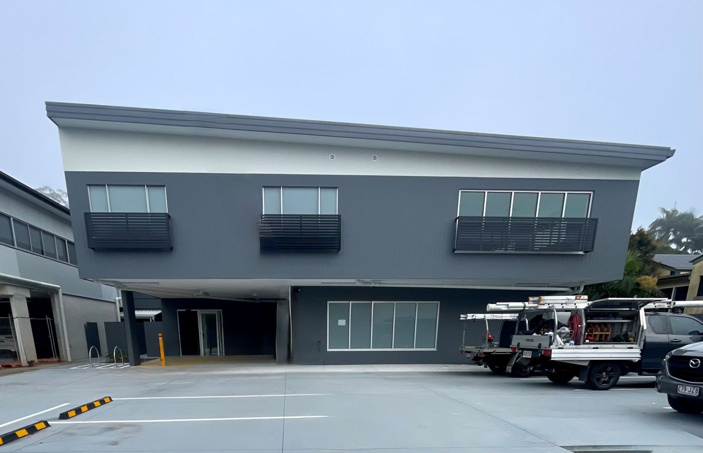 Completed commercial building with hardstand and services in place