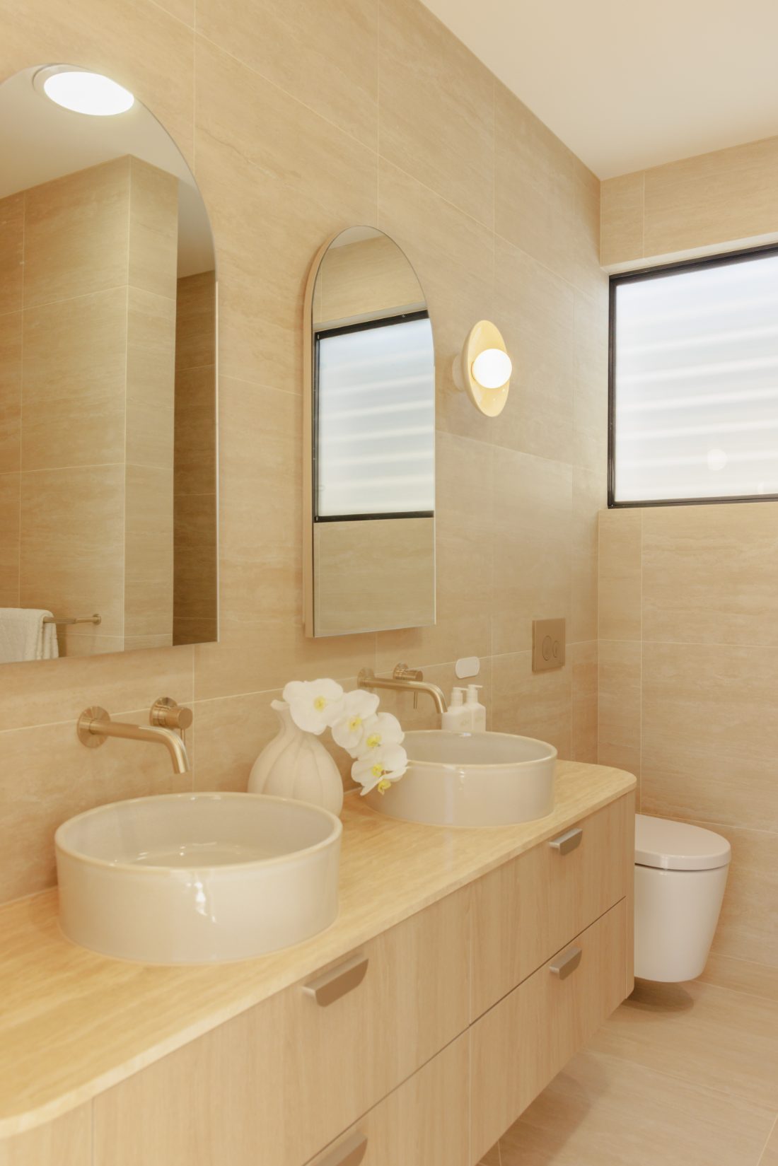 Twin vessel basins with brushed brass tapware, McCarthy Homes